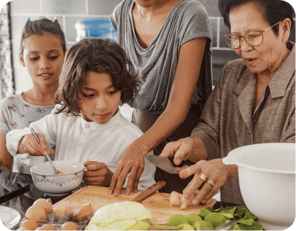 Family cooking together in kitchen
